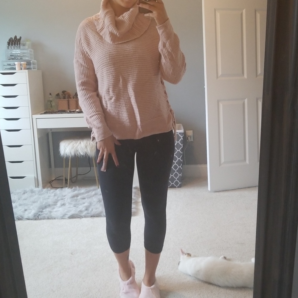 Cute sweater with braids on side